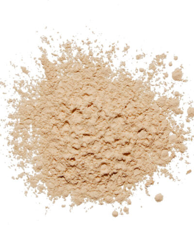 Beige powder on a white background